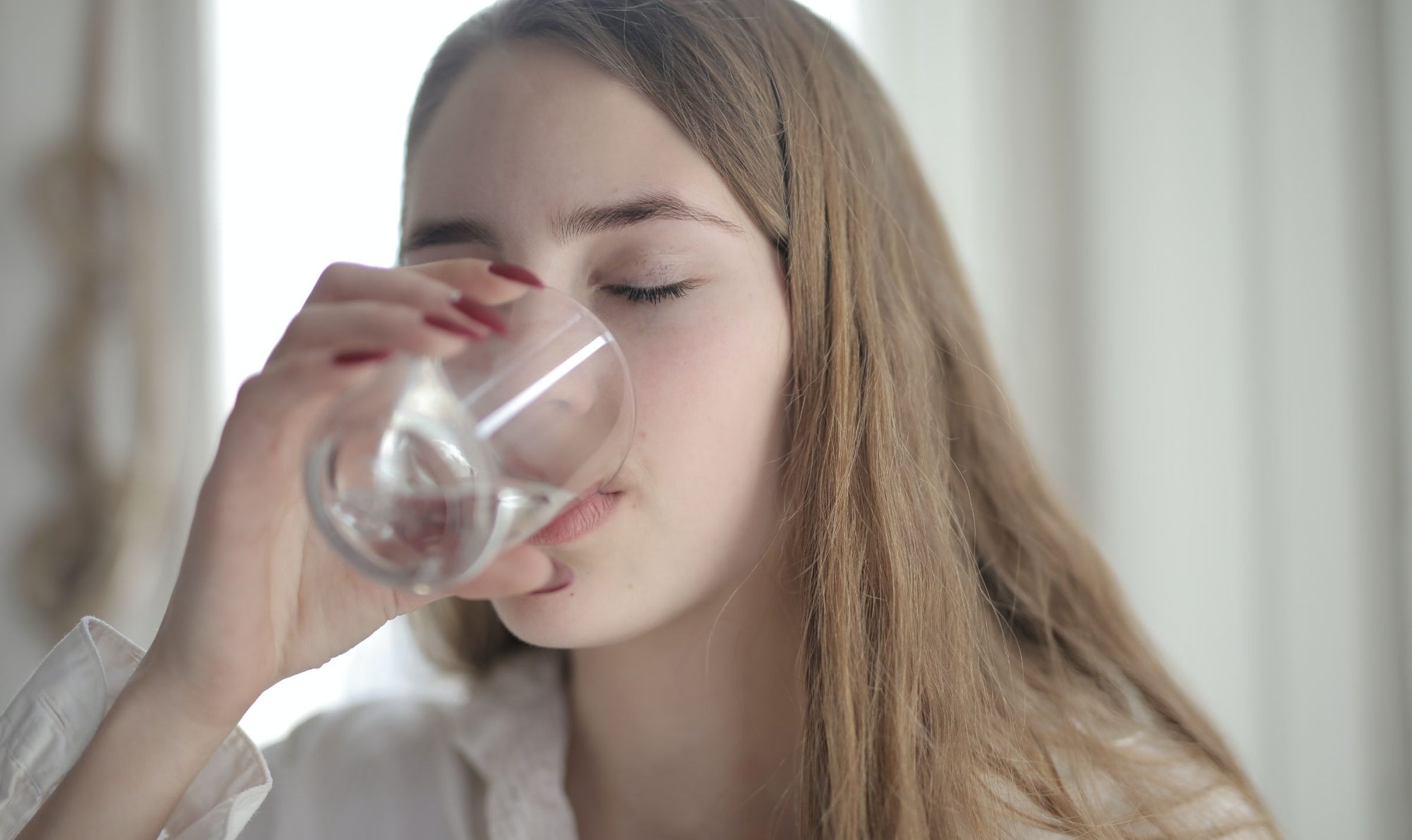 Waking Up Thirsty and Tired? Here's How To Fix It