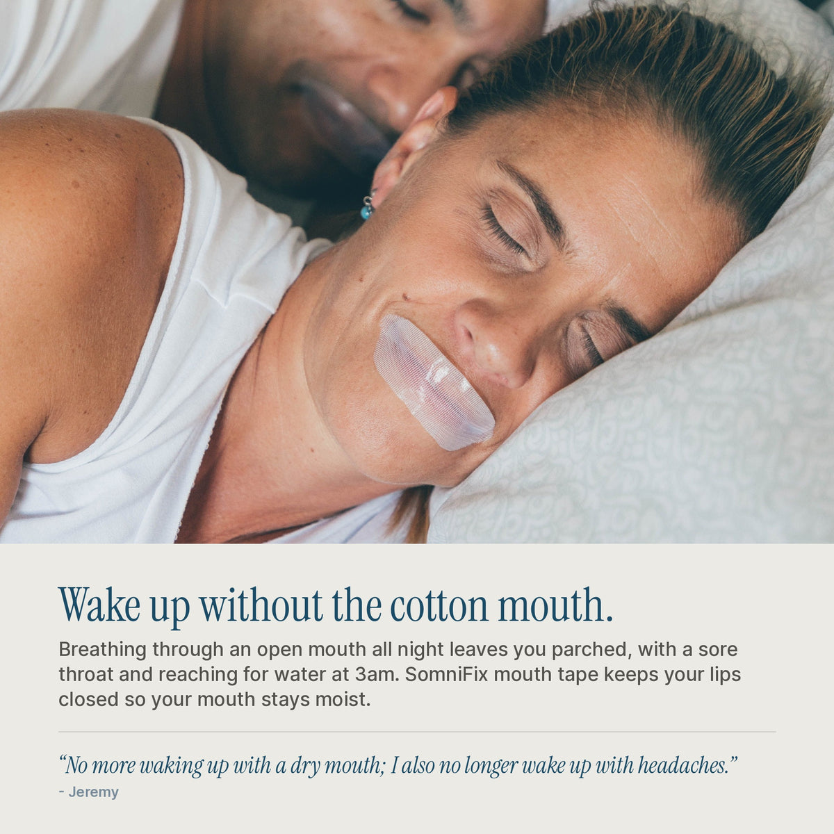 Woman asleep wearing SomniFix mouth tape, which keeps lips closed so the mouth stays moist and does not wake you parched at 3am.